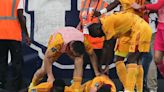 Bordeaux loses chance for Ligue 1 promotion after fan storms field and pushes player