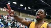 World champion Noah Lyles won the 100-meter title at the Bermuda Grand Prix track meet in a wind-aided 9.96 seconds