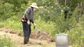 Small group works to upkeep graves including those of Buffalo Soldiers; looking for more volunteers