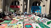 Pro-Palestine Activists Protest at the Met, Unfurling a Large Quilt Across Museum’s Stairs