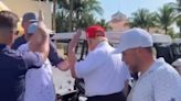 Awkward video shows Trump ducking a high five from admirer