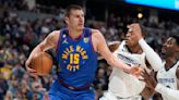 Jokic's triple-double lifts Nuggets over Grizzlies 113-97