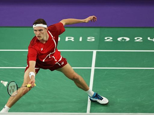 Olympics-Badminton-Denmark's Axelsen beats Thailand to the men's singles gold