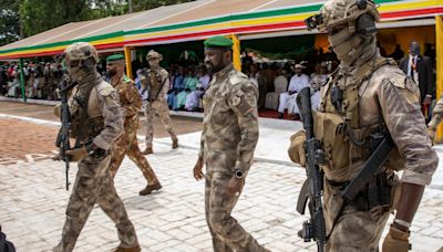 Extremists attack a military training camp in Mali’s capital and authorities close its airport