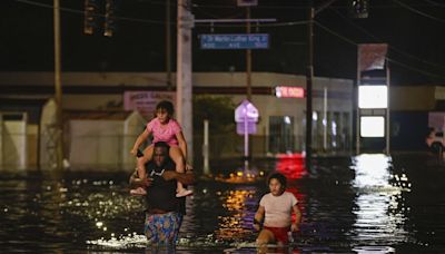 Helene lashes the South with wind and sheets of rain. Millions are without power