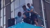 Jack Grealish almost falls off bus during Man City parade day after FA Cup loss
