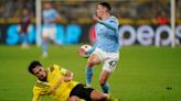 Man City secure top spot in group despite being held by Borussia Dortmund