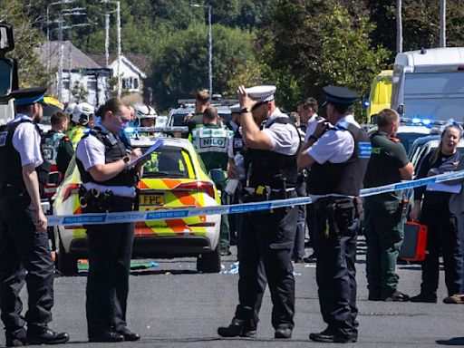 2 children dead and 11 people injured in stabbing rampage at a dance class in England, police say