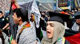 Small anti-war protest ruffles University of Michigan graduation ceremony