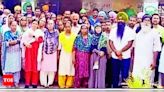 Parents and villagers support mid-day meal workers after derogatory remarks | Ludhiana News - Times of India