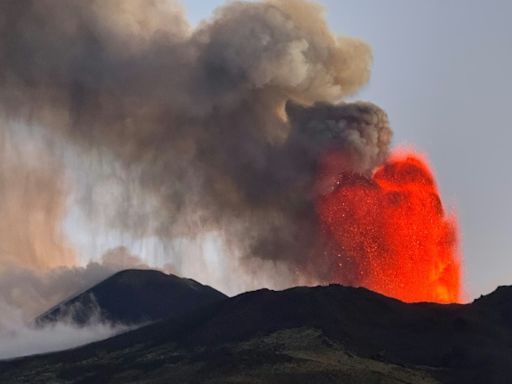 Flights slowly resume at Sicily's Catania airport as volcano erupts