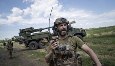 Ukrainians flee Russian advance as footage shows decimated village