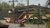 Heavy rain swells rivers, causing floods in much of Thailand