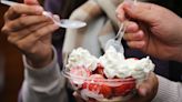 Why do Wimbledon fans eat strawberries and cream?