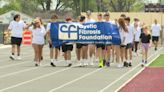 Local high school hosts a walk-a-thon to raise funds for Cystic Fibrosis