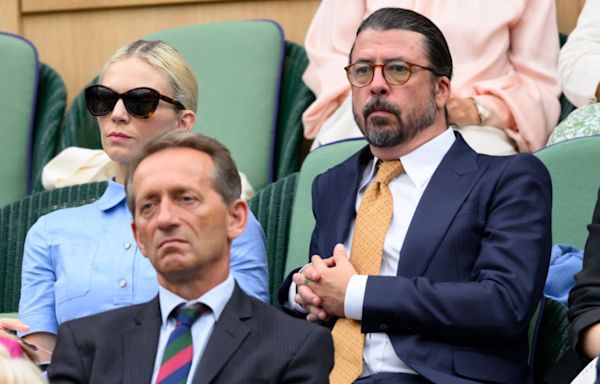 Dave Grohl Is Almost Unrecognizable in a Navy Suit and Sleek Ponytail at Wimbledon: See the Pics