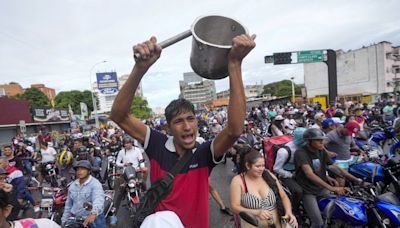 Crowds take to Venezuelan streets to protest what they say is president's attempt to steal election