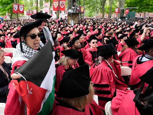 Group of graduates walk out of Harvard commencement chanting 'Free, free Palestine'