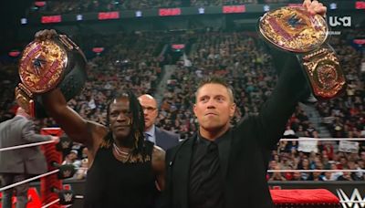 Triple H Unveils New World Tag Team Titles On 4/15 WWE RAW