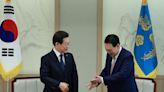 South Korea's Yoon meets opposition leader in bid to reset presidency