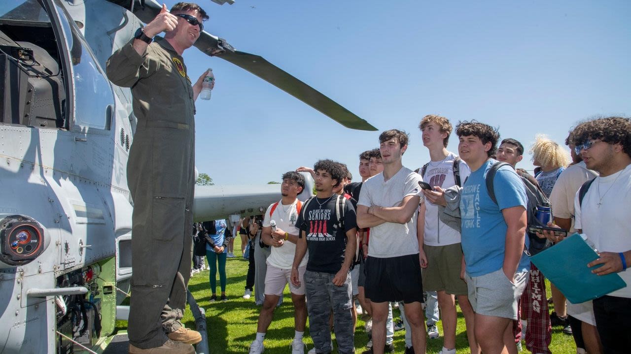 Marines land in Walt Whitman's field, take students by storm and music