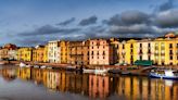 Pretty European town is famous for its multicoloured houses and vineyards