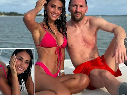 Messi shows off boot as Antonela wows on boat trip with pal Suarez and family