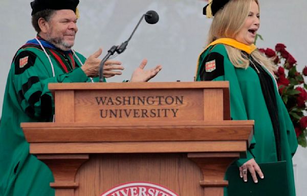 Jennifer Coolidge urges ‘self-acceptance’ to Washington U. grads. About 50 protest outside ceremony.