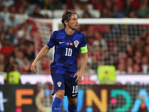 Luka Modrić scores the winner against Poland