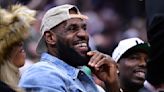 LeBron James greeted with rousing ovation from Cavaliers fans while sitting courtside for Celtics game