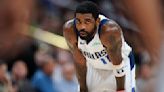 Mavericks guard Kyrie Irving on crutches, wearing walking boot; no timetable for his return