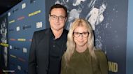 Bob Saget's widow Kelly Rizzo shares glimpse of new home and wall of curated 'Bob things': 'The happy reminders are therapeutic'