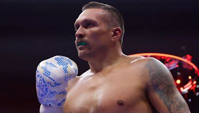 Usyk beats Fury to become boxing's first undisputed heavyweight champ since 1999