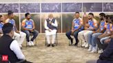 In Pics: PM Narendra Modi's chat session with Rohit Sharma, Virat Kohli and co - Champions with PM Modi