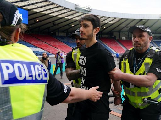Police charge 24-year-old man over goalpost protest at Scotland v Israel match
