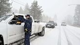 Blizzards bury Plains as tornadoes head for South