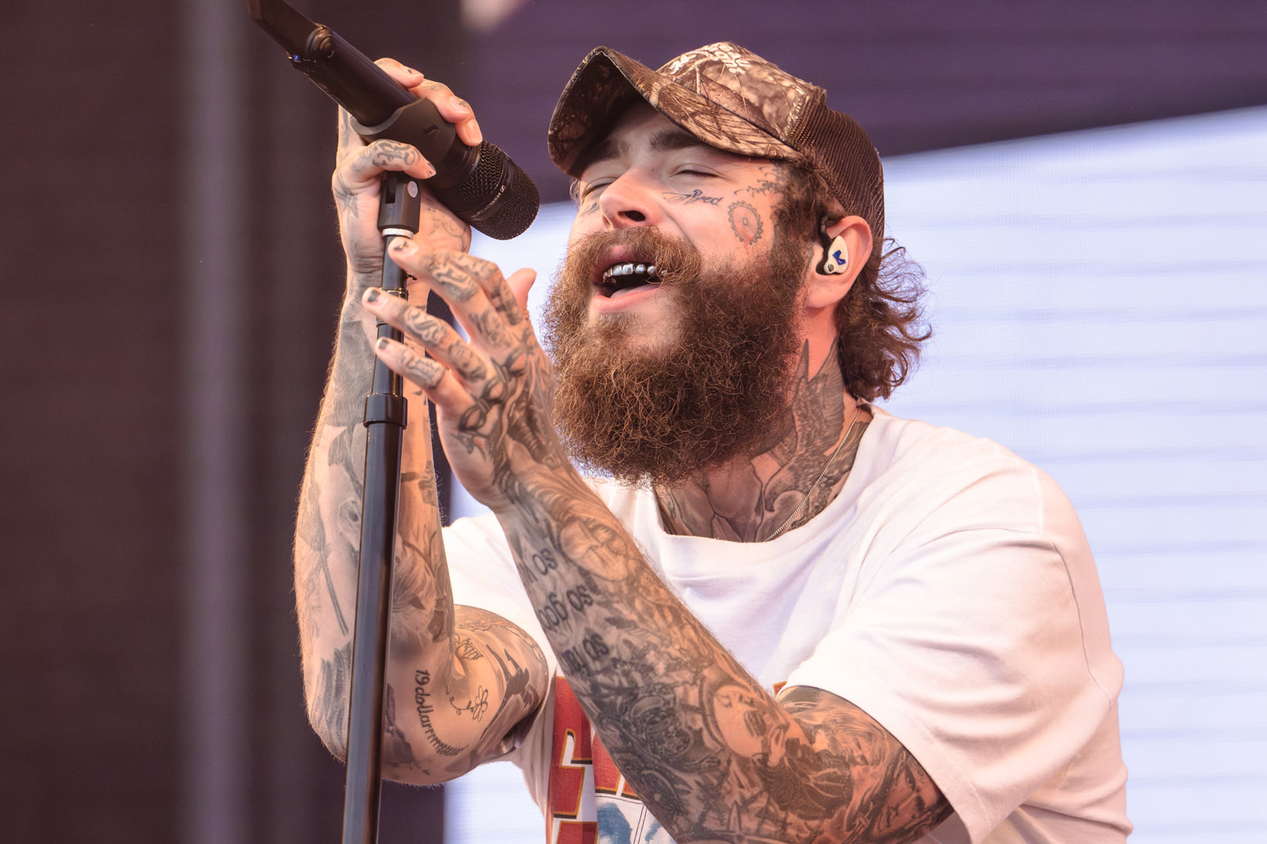 Watch Post Malone at the Grand Ole Opry With Braid Paisley, Vince Gill, and Others