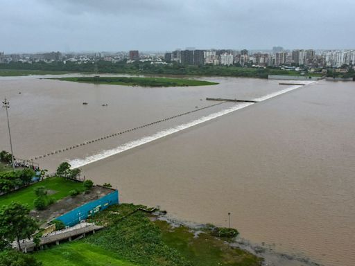 Surat Deputy Mayor Criticised for Piggyback Ride in Flood Area