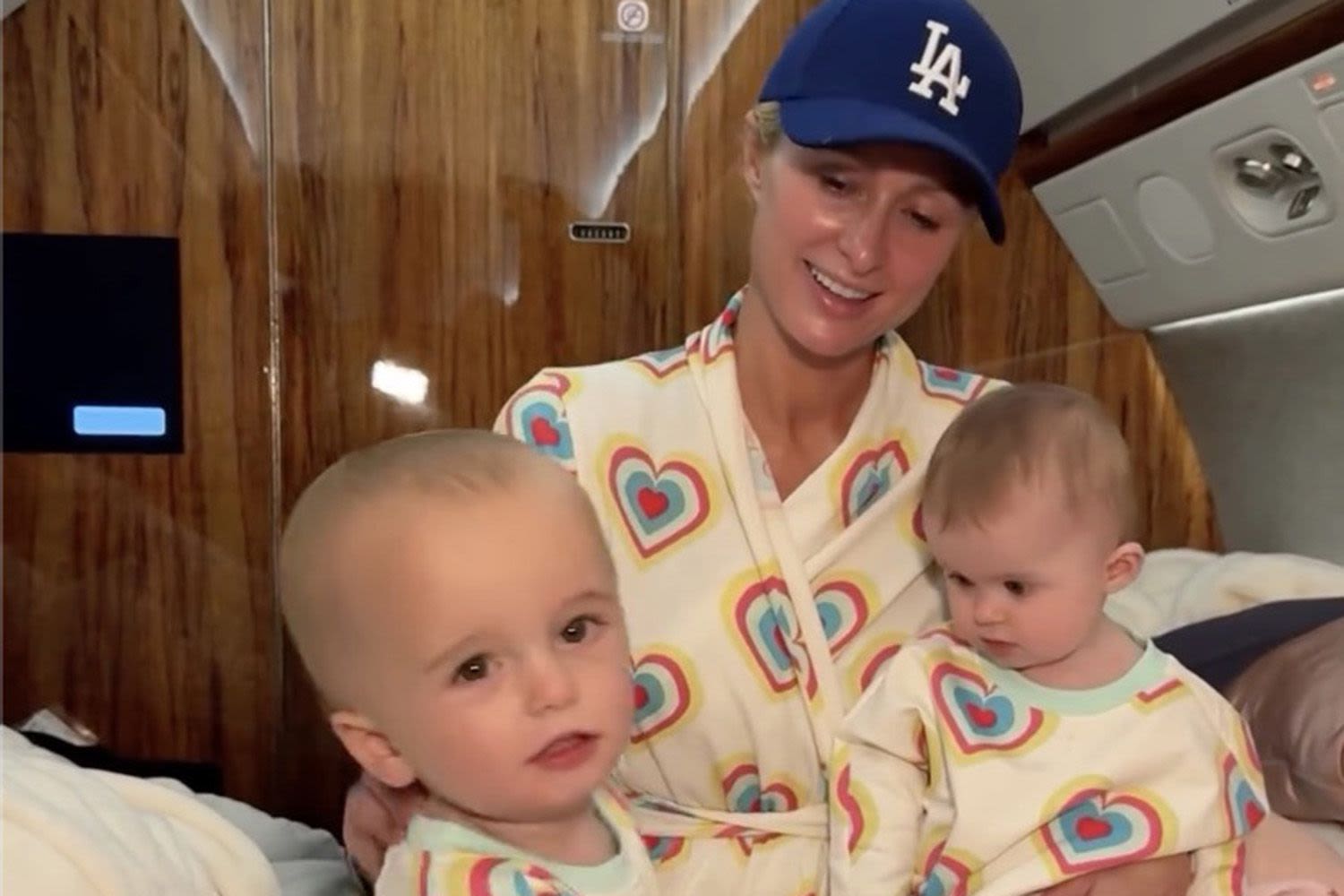 Paris Hilton Twins with Son Phoenix and Daughter London in Matching Pajamas Aboard Private Jet