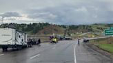 Eastbound I-70 closed in Genesee for rollover crash