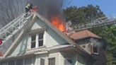 Mayday ordered after firefighter gets trapped on roof of burning building in Boston