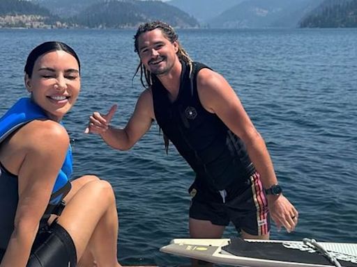 Kim Kardashian gets wakeboard lessons from a hunky instructor