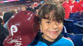 Phillies' Harper flips out on ump, tosses helmet into the stands where it's retrieved by 10-year-old