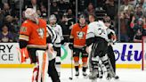 Kings overcome goalie's match penalty, beat rival Ducks 6-3