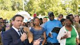 Gov. Ron DeSantis, known for pro-gun and 'anti-woke' policies, booed at vigil for Black Jacksonville shooting victims