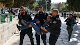 Israeli forces storm Jerusalem mosque, arrest hundreds of Palestinians