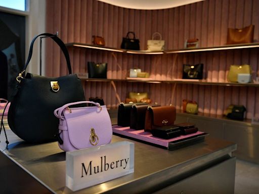 UK's Frasers proposes Mulberry takeover to avoid 'another Debenhams'