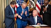 Biden signs climate, drug price bill into law, another win for him amid crisis for U.S. democracy