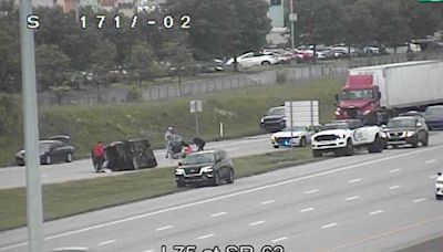 Ramp blocked after car overturns on I-75 in Monroe