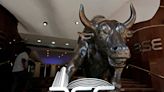 Indian shares inch lower in choppy trade amid high volatility